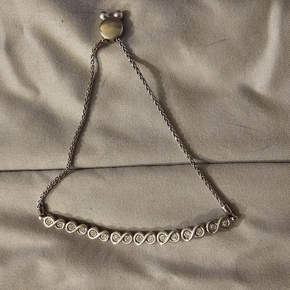 Delicate Silver Bracelet with Intricate Openwork Design